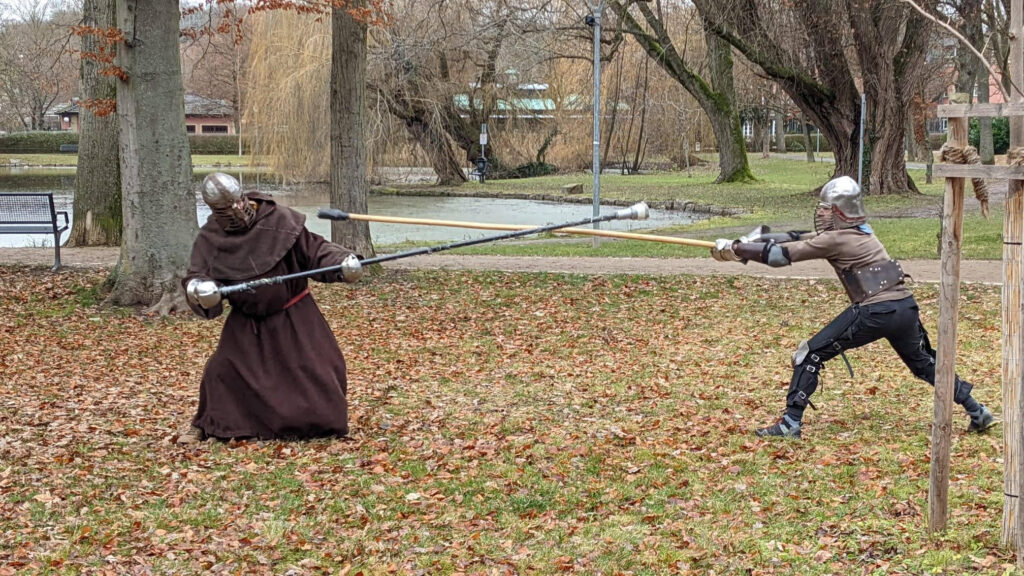 Me (left) teaching a talented new fighter the joys of stabbing people in the face.